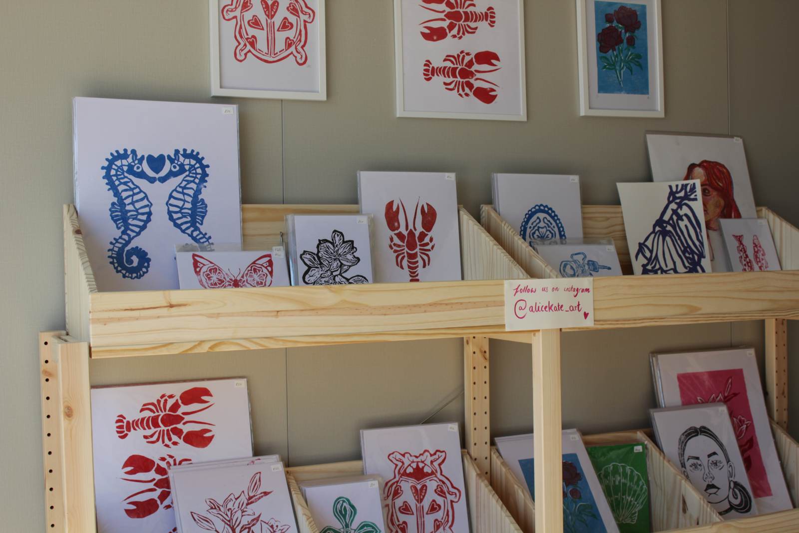 Shelves of lino prints and cards inside the Alice Kate studio shop
