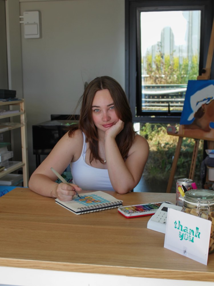 At the studio counter